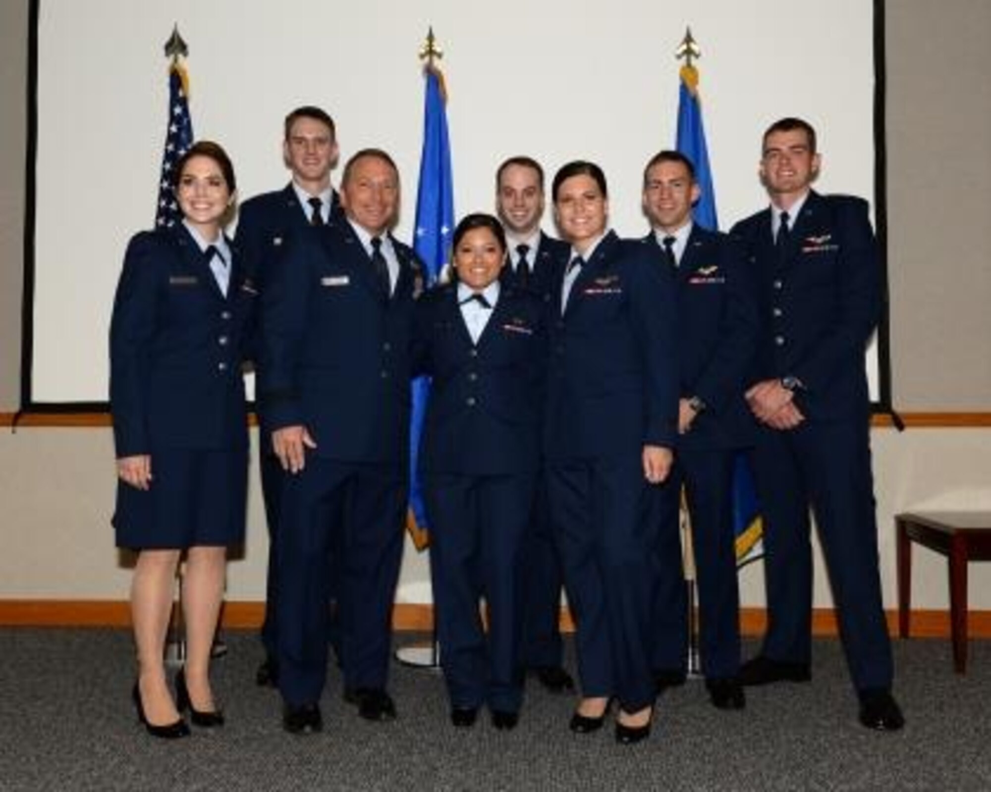 Brig. Gen. David Hicks, 1st Air Force (Air Forces Northern) vice commander, stands with newly-pinned Air-Battle-Management Course graduates at the 337th Air Control Squadron here Aug. 26. The general was the featured speaker at the graduation ceremony.  (Air Force Photo Released/Airman 1st Class Cody Miller)