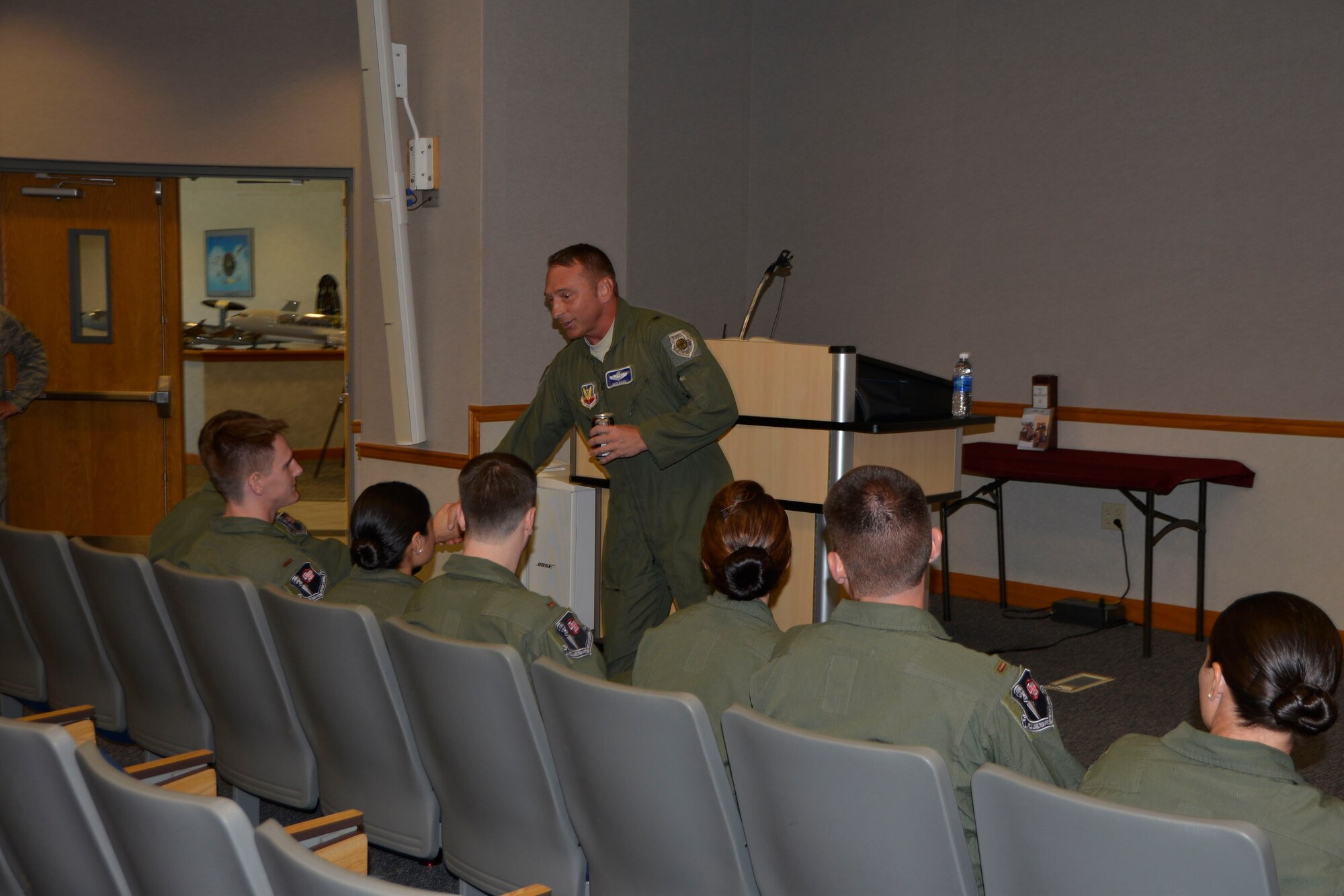 Brig. Gen. David Hicks, 1st Air Force (Air Forces Northern) vice commander, greets some Air-Battle-Manager Course graduates at the 337th Air Control Squadron here prior to a mentoring  question-and-answer session with students and course staff on their graduation day Aug. 26. Hicks later presided over the ceremony where the graduates received their wings. (Air Force Photo Released/Mary McHale)