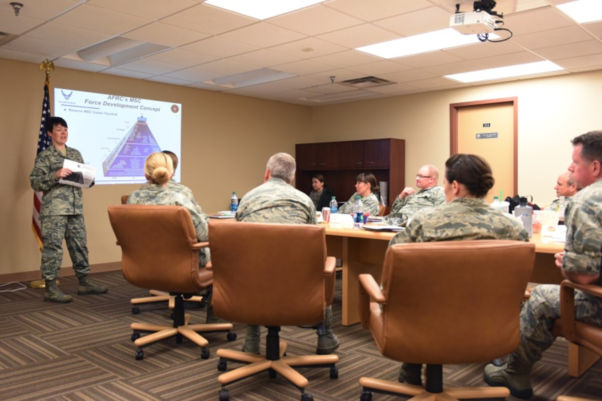 Col. Michelle Wagner, 452nd Aeromedical Squadron commander from March Air Force base, Ca., briefs officer force development to 944th Aeromedical Staging Squadron officers Aug. 25. Wagner was a guest speaker during the Nursing Leadership Force Development Training held Aug. 24 to Aug. 28. (U.S. Air Force photo taken by Staff Sgt. Lausanne Kinder)