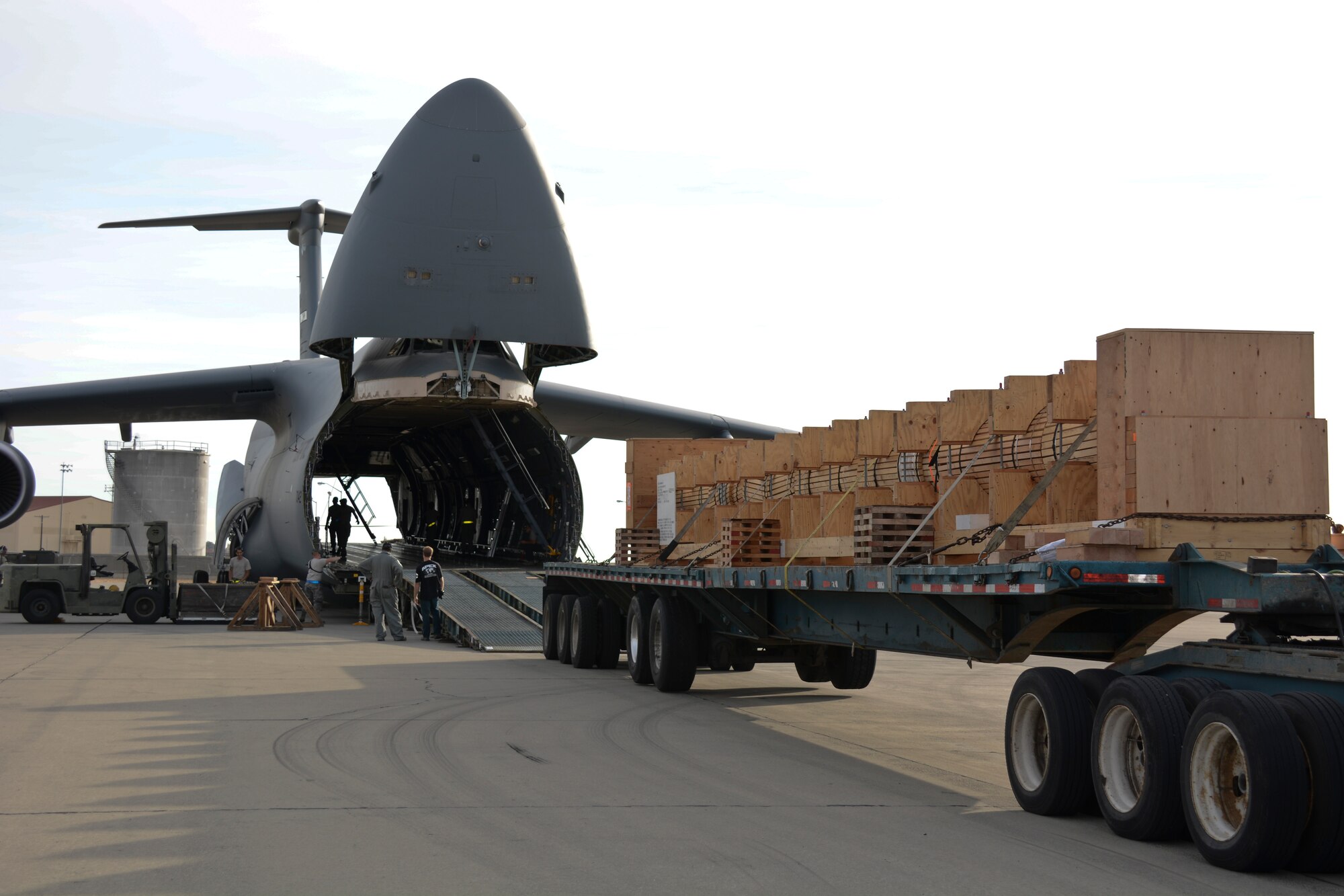 A C-5M Super Galaxy is loaded Aug. 28 at Travis Air Force Base, California. The Navy propeller shaft will ship to Japan as the third shaft of three to be transported for the USS Shiloh, which is currently in dry dock. (U.S. Air Force photo by Airman 1st Class Amber Carter)