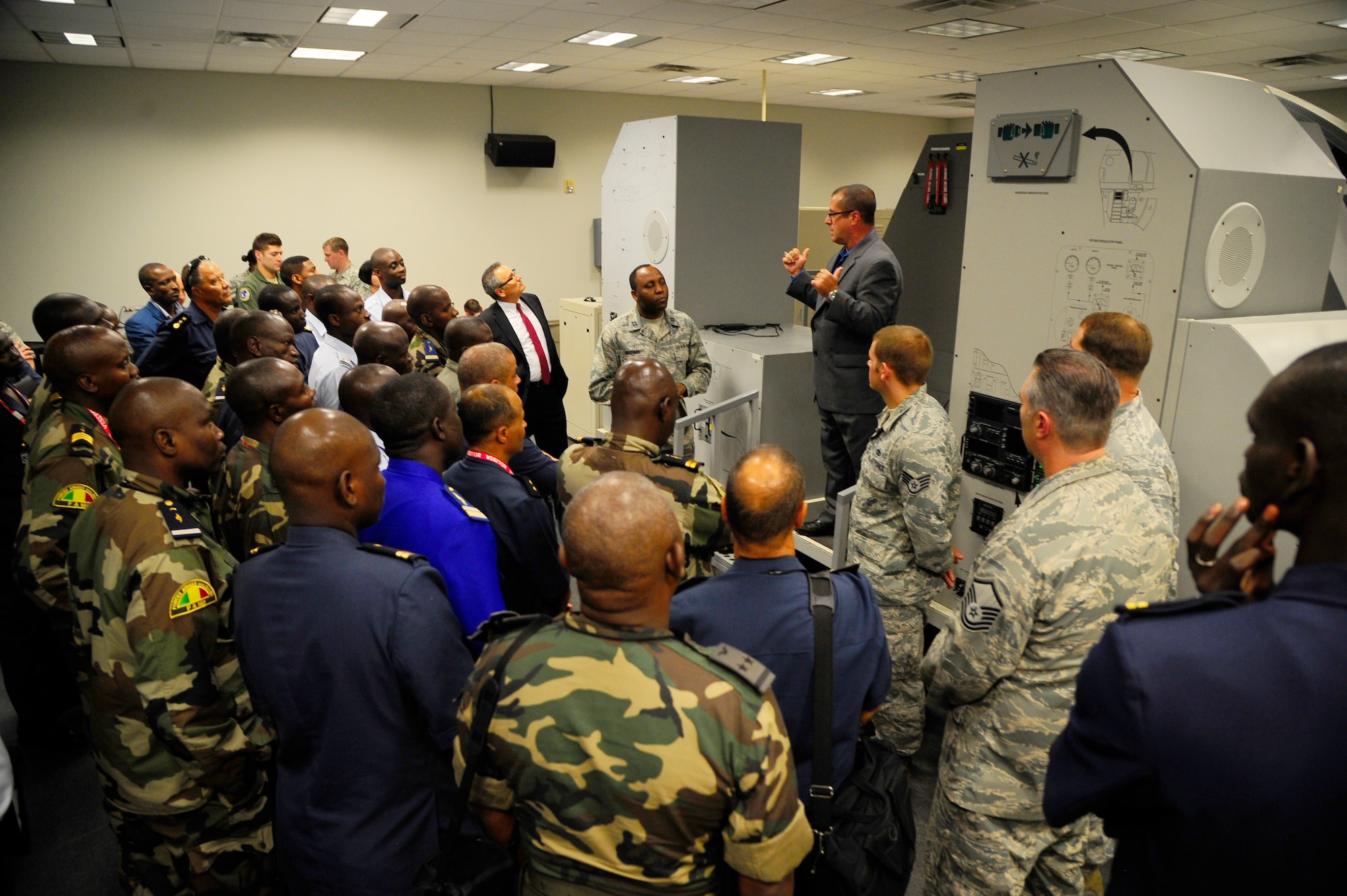 African military personnel tour the 305th Air Mobility Wing's Maintenance Training Facility at Joint Base McGuire-Dix-Lakehurst during the African Partnership Flight hosted by the 621st Contingency Response Wing Sept. 2, 2015. Participating African nations included Angola, Senegal, Mali, Niger, Burkina Faso, Nigeria, Ghana and Tunisia. JB MDL units involved with the APF included the 621st CRW, 87th Air Base Wing, 305th Air Mobility Wing, and the 1/150th Aviation Battalion. (U.S. Air Force photo by 1st Lt. Jake Bailey)