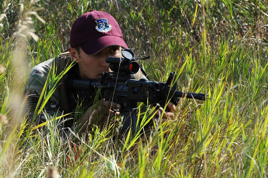 Members of the 91st Security Forces Group Global Strike Challenge team walk in a formation during tactical training at Minot Air Force Base, N.D., Sept. 2, 2015. To train for the GSC, the team has been doing physical and mental training every day, as well as working on their tactics and teamwork. (U.S. Air Force photo / Senior Airman Kristoffer Kaubisch)