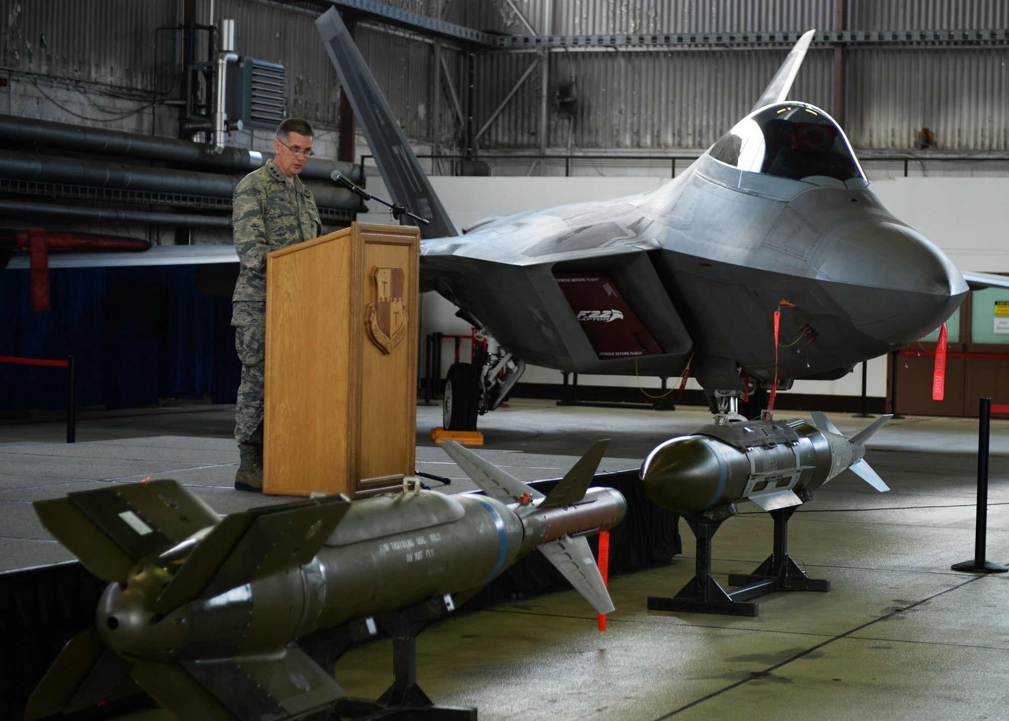 U.S. Air Force Lt. Gen. Timothy Ray, 3rd Air Force and 17th Expeditionary Air Force commander speaks to Airmen and journalists during a media event in front of a U.S. Air Force F-22 Raptor at Hangar One at Spangdahlem Air Base, Germany, Sept. 3, 2015. The general spoke about the inaugural F-22 training deployment to Europe, which is funded by the European Reassurance Initiative which aims to increase the capability, readiness and responsiveness of NATO forces in part by funding rotational force presence in Eastern Europe. (U.S. Air Force photo by Staff Sgt. Joe W. McFadden/Released)
