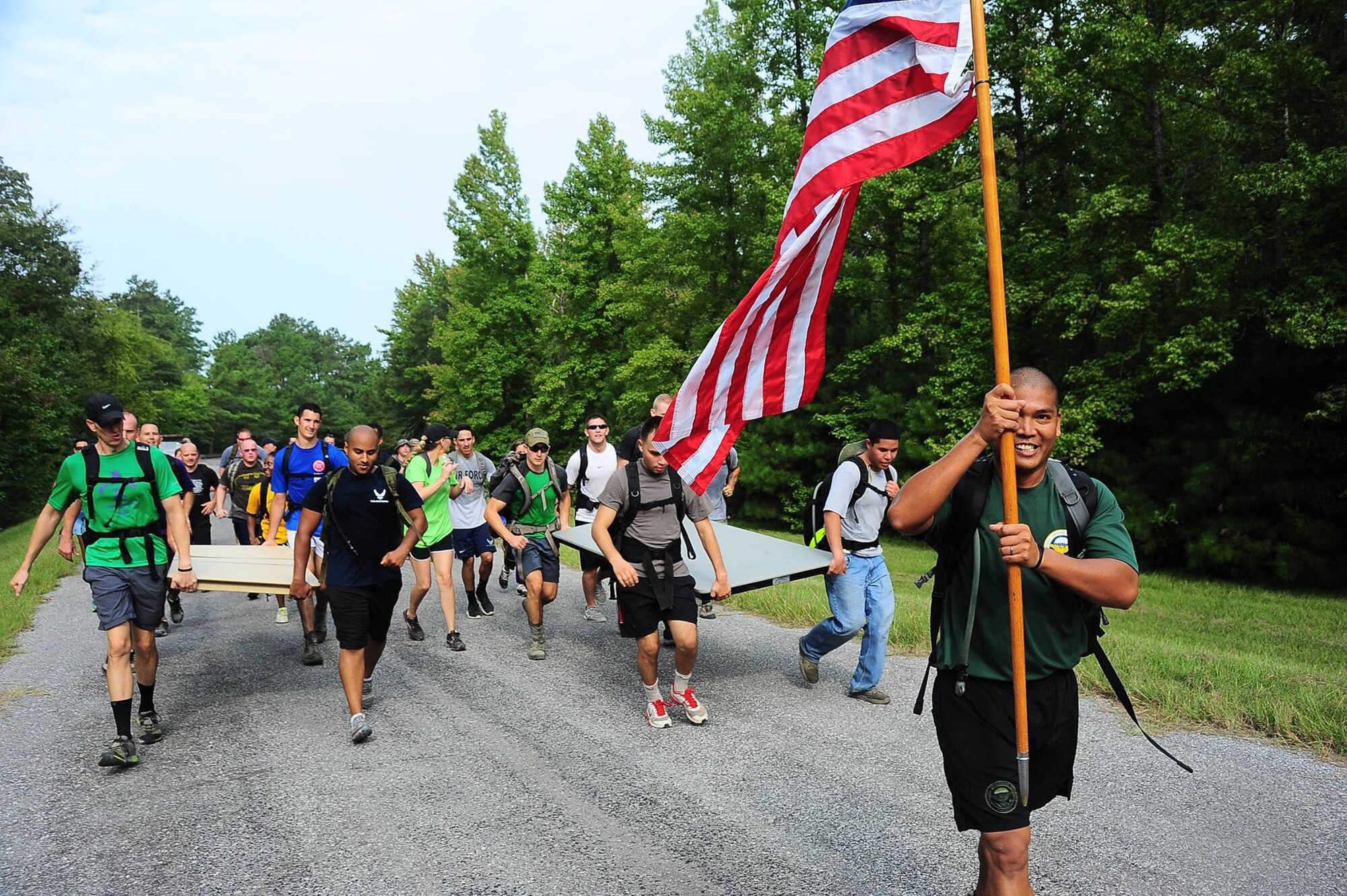 Team BLAZE members participate in the Team Cohesion Challenge Sept. 2 on Columbus Air Force Base. The athletes ran between 7 and 10 miles and completed numerous exercises and teamwork events over the span of 5 hours, Mississippi. (U.S. Air Force photo/Airman 1st Class Daniel Lile)