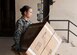 U.S. Air Force Senior Airman Giorgiamikaela Arnold, 7th Logistics Readiness Squadron B-1 Aircraft Part Store technician, carries a cardboard reusable container Aug. 8, 2015, at Dyess Air Force Base, Texas. Per Department of Defense Policy, aircraft parts must be shipped and stored in the appropriate container. The Reusable Container Program is designed to meet DoD policy by ensuring every part, stored or shipped, has the appropriate container. (U.S. Air Force photo by Airman Quay Drawdy/Released)