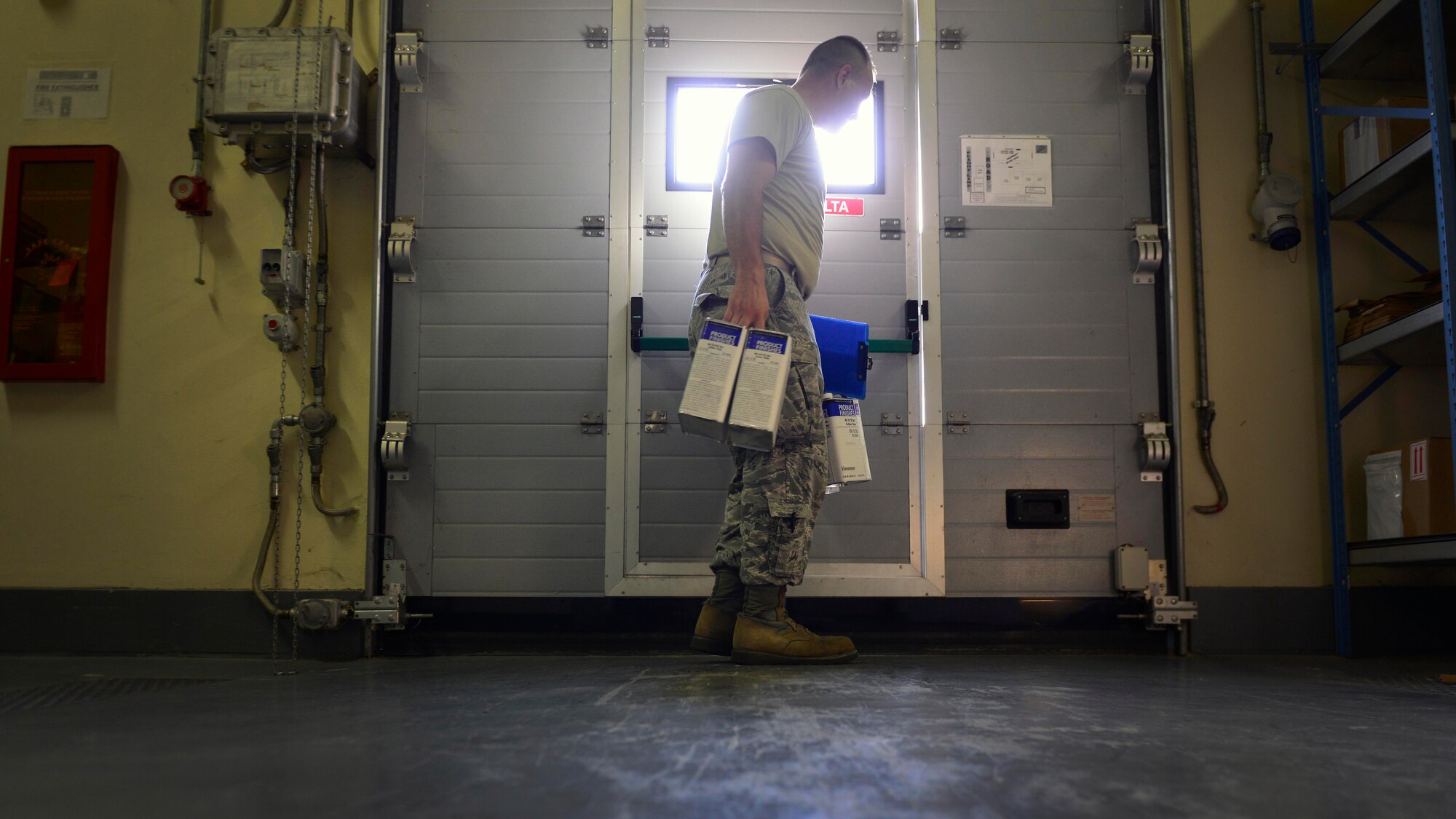 U.S. Air Force Senior Airman Anthony Wilson, 31st Logistics Readiness Squadron Vehicle Operations journeyman, picks up HAZMAT items, Sept. 2, 2015, at Aviano Air Base, Italy. The HAZMAT Supply office delivers items to Ghedi Air Base, Italy, and Camp Darby, Italy. (U.S. Air Force photo by Airman 1st Class Cary Smith/Released)