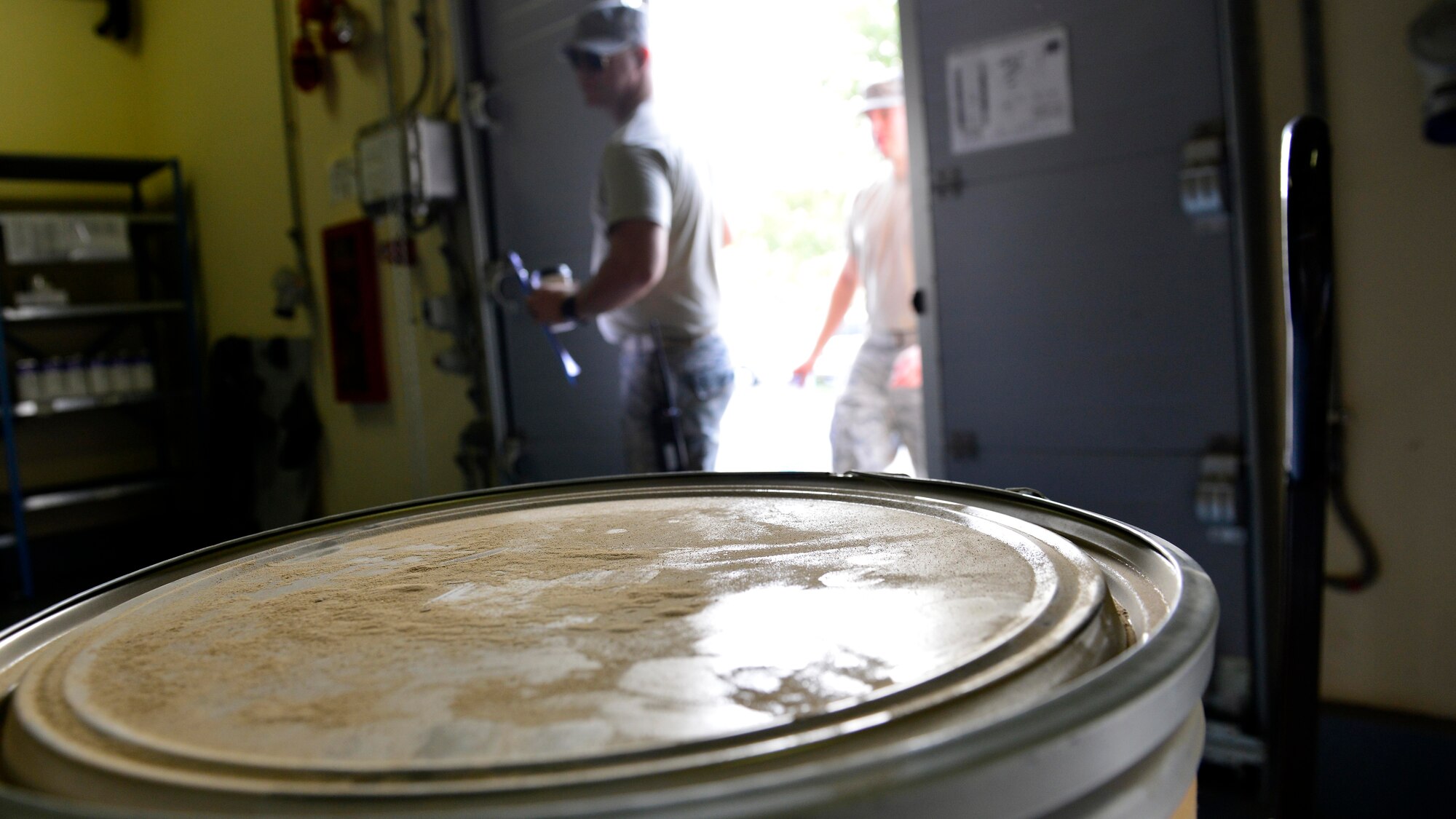 U.S. Air Force Senior Airmen Anthony Wilson and Jeremy Logan, 31st Logistics Readiness Squadron Vehicle Operations journeymen, arrive at the 31st LRS Hazardous Material Supply warehouse to pick up items, Sept. 2, 2015, at Aviano Air Base, Italy. The HAZMAT Supply office delivers items to Ghedi Air Base, Italy, and Camp Darby, Italy. (U.S. Air Force photo by Airman 1st Class Cary Smith/Released)