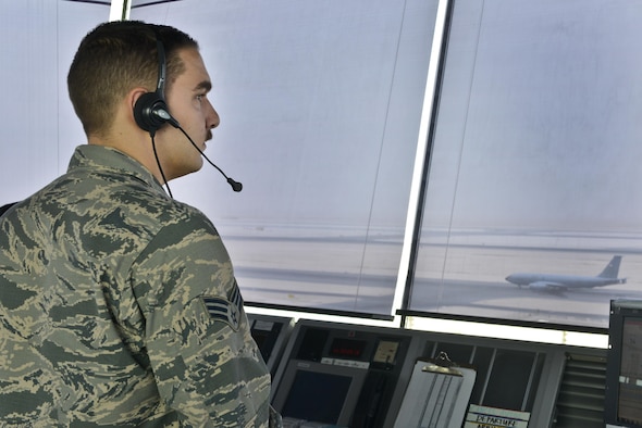 Senior Airman Nicholas Randolph, 379th Expeditionary Operations Support Squadron air traffic controller, talks to an aircrew aboard a KC-135 Stratotanker that is waiting for their turn for takeoff September 2, 2015 at Al Udeid Air Base, Qatar. Airmen of the 379th EOSS ATC work closely with Qatari military ATC conducting airfield operations to support coalition forces deployed here in support of Operation Inherent Resolve and Operation Freedom’s Sentinel. (U.S. Air Force photo/Staff Sgt. Alexandre Montes)