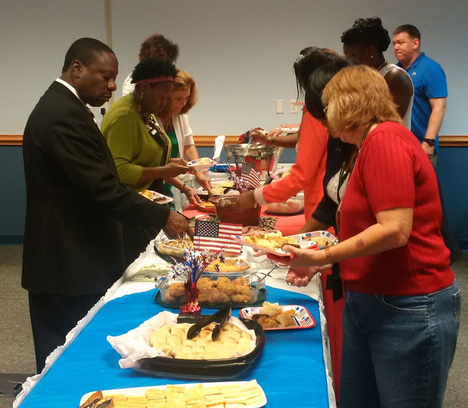 NORFOLK, Va. -- Norfolk District employees have a team "end-of-year" breakfast  before they launch into their busiest month of the year: September. The month marks the end of the fiscal year, when contracts and budgets must all be closed out.