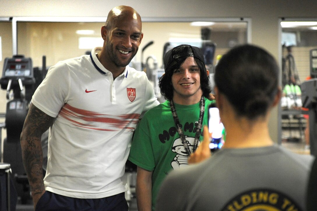 U.S. men's national soccer team goalkeeper Tim Howard visits with 17-year-old Daniel Irwin at Walter Reed National Medical Center in Bethesda, Md., Sept. 3, 2015. DoD photo by Marvin Lynchard