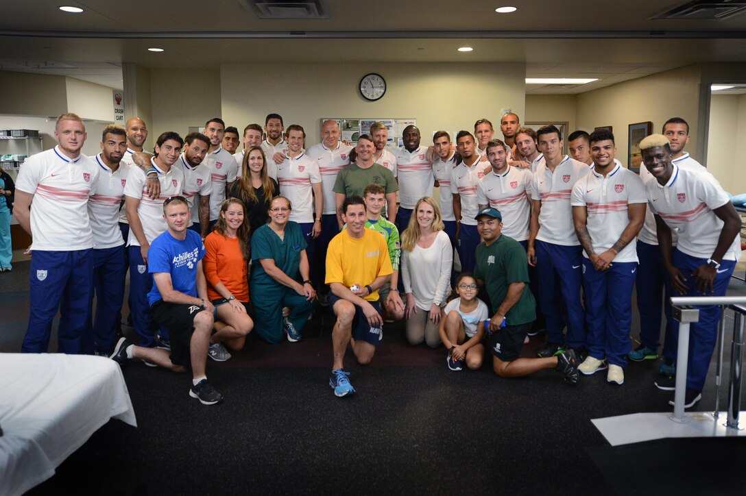 U.S. Men’s National Team members pose for group shot with wounded warriors at Walter Reed National Medical Center in Bethesda, Md., Sept. 3, 2015. DoD photo by Marvin Lynchard