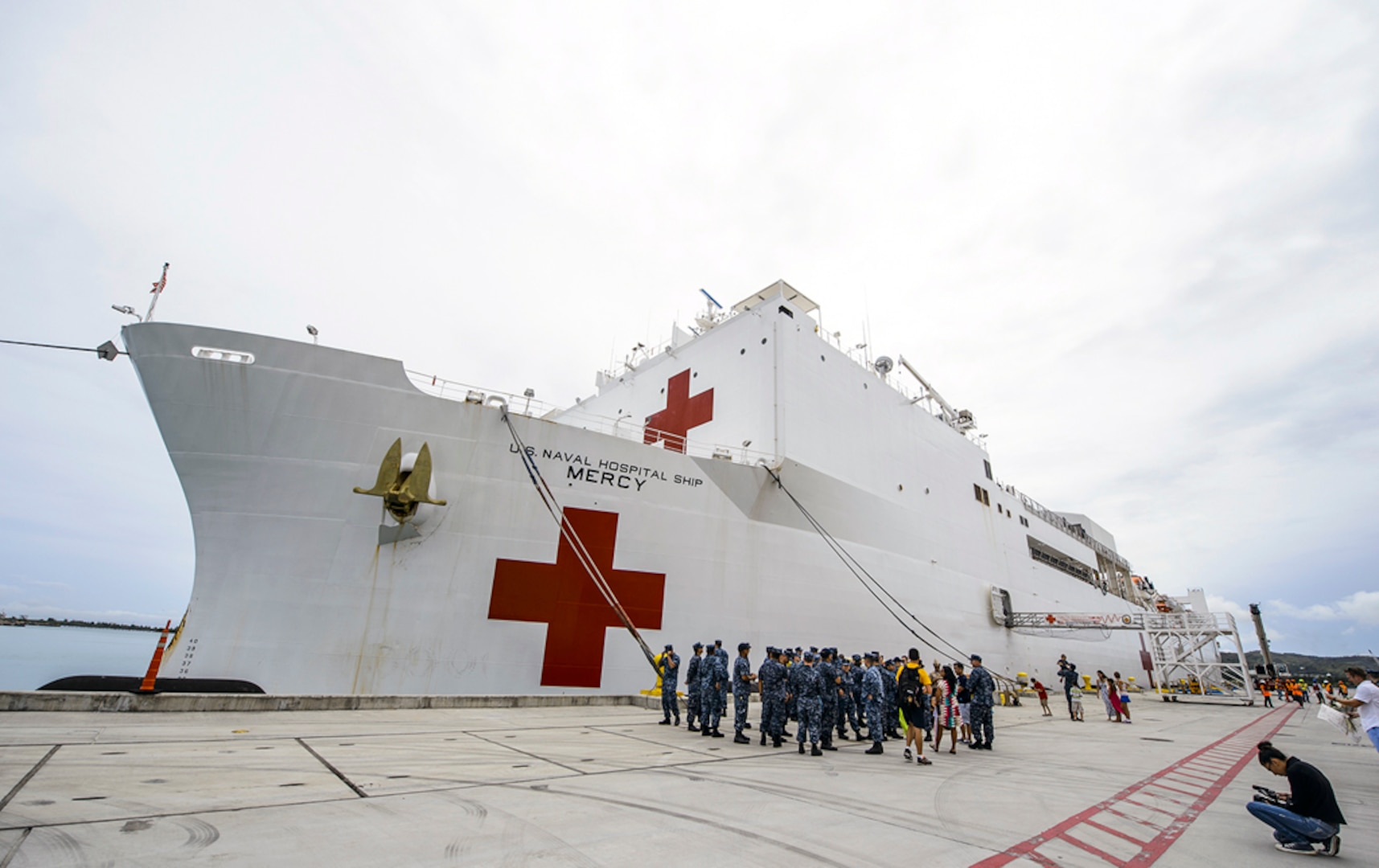 U.S. NAVAL BASE GUAM (Sept. 4, 2015) - The hospital ship USNS Mercy (T-AH 19) is docked at a pier at Naval Base Guam during Pacific Partnership 2015. Mercy made a port visit to Guam to offload personnel deployed aboard the ship for the past four months for PP15. Pacific Partnership is in its 10th iteration and is the largest annual multilateral humanitarian assistance and disaster relief preparedness mission conducted in the Indo-Asia-Pacific region. While training for crisis conditions, Pacific Partnership missions to date have provided real world medical care to approximately 270,000 patients and veterinary services to more than 38,000 animals. Additionally, the mission has provided critical infrastructure development to host nations through more than 180 engineering projects. 