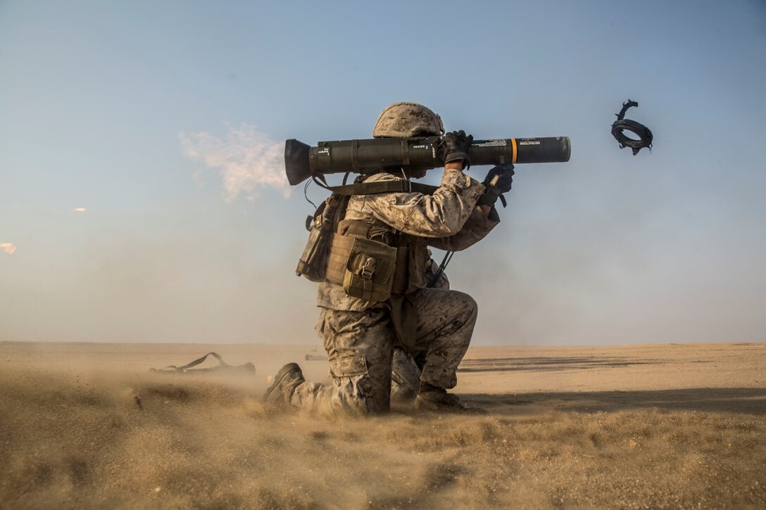 KUWAIT (Aug. 26, 2015) U.S. Marine Lance Cpl. Andres Bravo fires an AT4 rocket at a target during sustainment training. Bravo is a rifleman with Kilo Company, Battalion Landing Team 3rd Battalion, 1st Marine Regiment, 15th Marine Expeditionary Unit. During the training, Marines refined their marksmanship with the AT4. Elements of the 15th MEU are ashore in Kuwait for sustainment training to maintain and enhance the skills they developed during their pre-deployment training period. The 15th MEU is embarked with the Essex Amphibious Ready Group and deployed to maintain regional security in the U.S. 5th Fleet area of operations. (U.S. Marine Corps photo by Sgt. Emmanuel Ramos/Released)