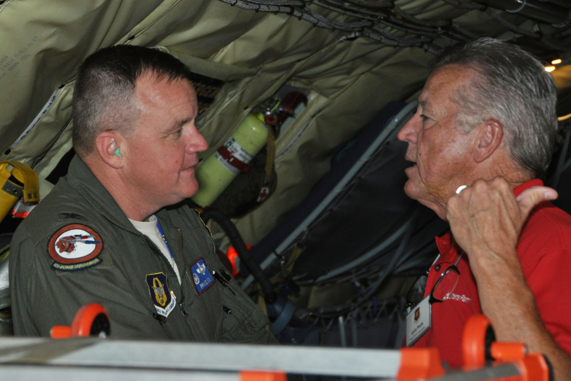 U.S. Air Force Col. Bruce Cox, 307th Bomb Wing commander, talks with Larry Poole of State Farm Insurance aboard a KC-135 Stratotanker, during the 2015 307th Bomb Wing Civic Leader Tour Sept. 1-2, 2015.  The tour gave 29 Louisiana civic leaders the opportunity to get a closer look at the mission of the Air Force Reserve during the two-day trip from Barksdale to Joint Base San Antonio and Dyess Air Force Base in Texas. The trip included a refueling of the B-52 Stratofortress and B-1 Lancer; a C-5 Galaxy and B-1 static tour; a visit to the Center for the Intrepid for wounded warriors; and networking with other local community leaders. (U.S. Air Force photo by Master Sgt. Mary Hinson/Released)