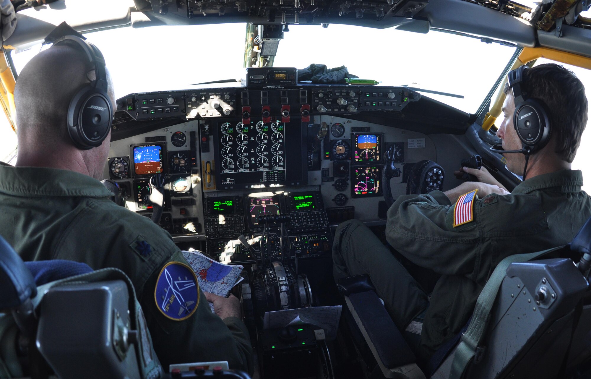 (Left to right) Lt. Col. Kevin Rainey and Maj. Mike McLain, 18th Air Refueling Squadron pilots, perform pre-flight checks before taking off on an air refueling mission Sept. 3, 2015, at McConnell Air Force Base, Kan.  The mission required the aircrew to refuel the U.S. Air Force Thunderbirds Air Demonstration Squadron as they flew from Nellis Air Force Base, Nev., to the Cleveland National Air Show in Ohio.   (U.S. Air Force photo by Tech. Sgt. Abigail Klein)