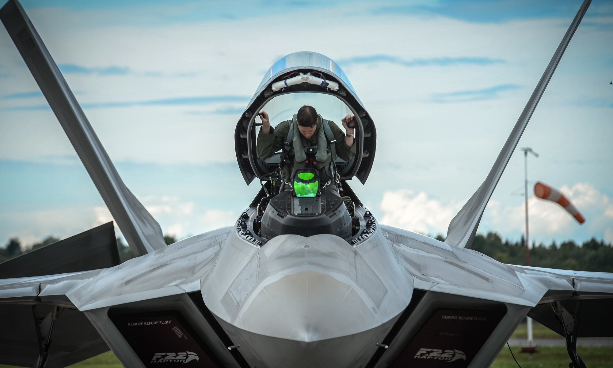 An F-22 pilot from the 95th Fighter Squadron based out of Tyndall Air Force Base, Fla., gets situated in his aircraft prior to taking from ??mari Air Base, Estonia, Sept. 4, 2015, during a brief forward deployment. The F-22s have previously deployed to both the Pacific and Southwest Asia for Airmen to train in a realistic environment while testing partner nations' ability to host advanced aircraft like the F-22. The F-22s are deployed from the 95th Fighter Squadron at Tyndall Air Force Base, Fla. The U.S. Air Force routinely deploys aircraft and Airmen to Europe for training and exercises. (U.S. Air Force photo/ Tech. Sgt. Ryan Crane)