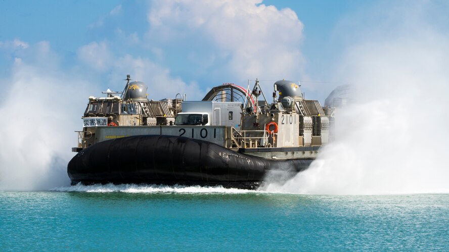 A Japan Maritime Self-Defense Force Landing Craft Air Cushion (LCAC) carrying vehicles and simulated victims maneuvers to land at Atta Port, Japan, during an annual Okinawa Prefectural Government bilateral disaster response exercise Sept. 5, 2015. The training, which has been conducted several times annually already, has previously involved U.S. Marine Corps personnel and equipment from around the island, but this is the first time Japanese aircraft have used Kadena’s runways as a reception point for JSDF responders from Honshu, or mainland Japan. (U.S. Air Force photo by Staff Sgt. Maeson L. Elleman)