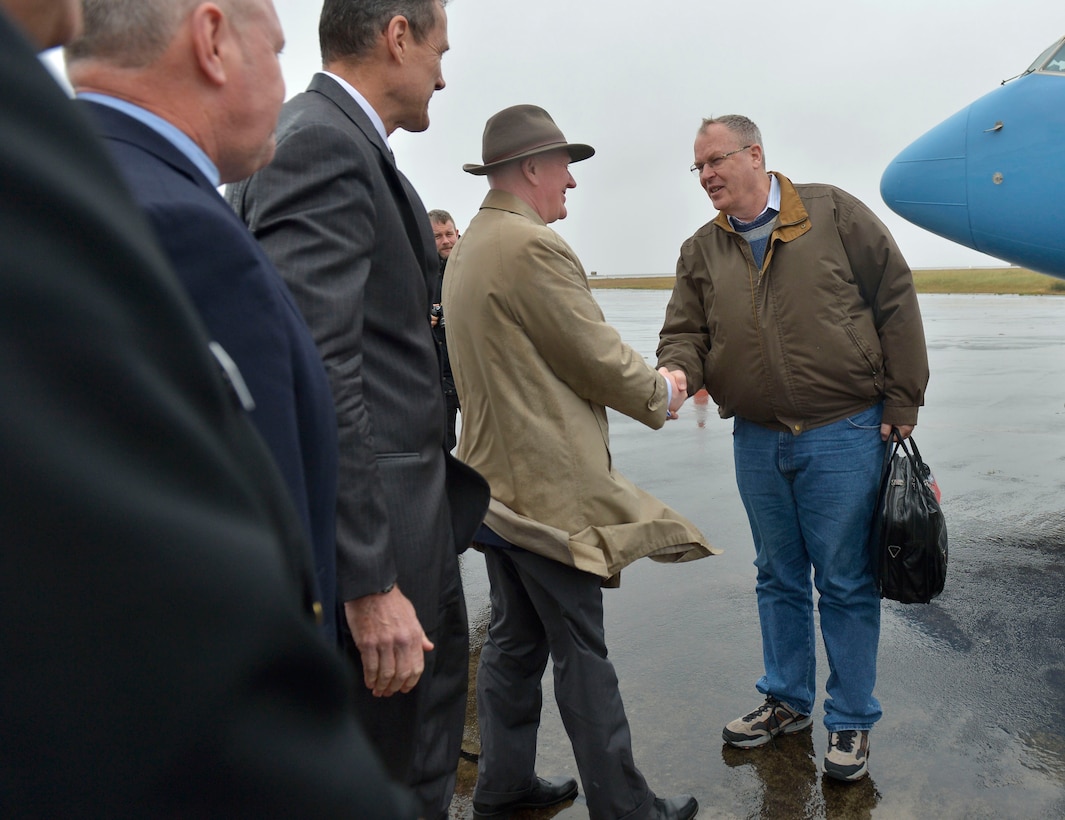U.S. Deputy Defense Secretary Bob Work, right, exchanges greetings with Arnor Sigurjonsson, chief of defense of Iceland, upon arriving in Keflavik, Iceland, Sept. 6, 2015. Iceland was Work's first stop during a weeklong trip to Europe, which also is scheduled to include visits to Norway and the United Kingdom. DoD photo by Glenn Fawcett