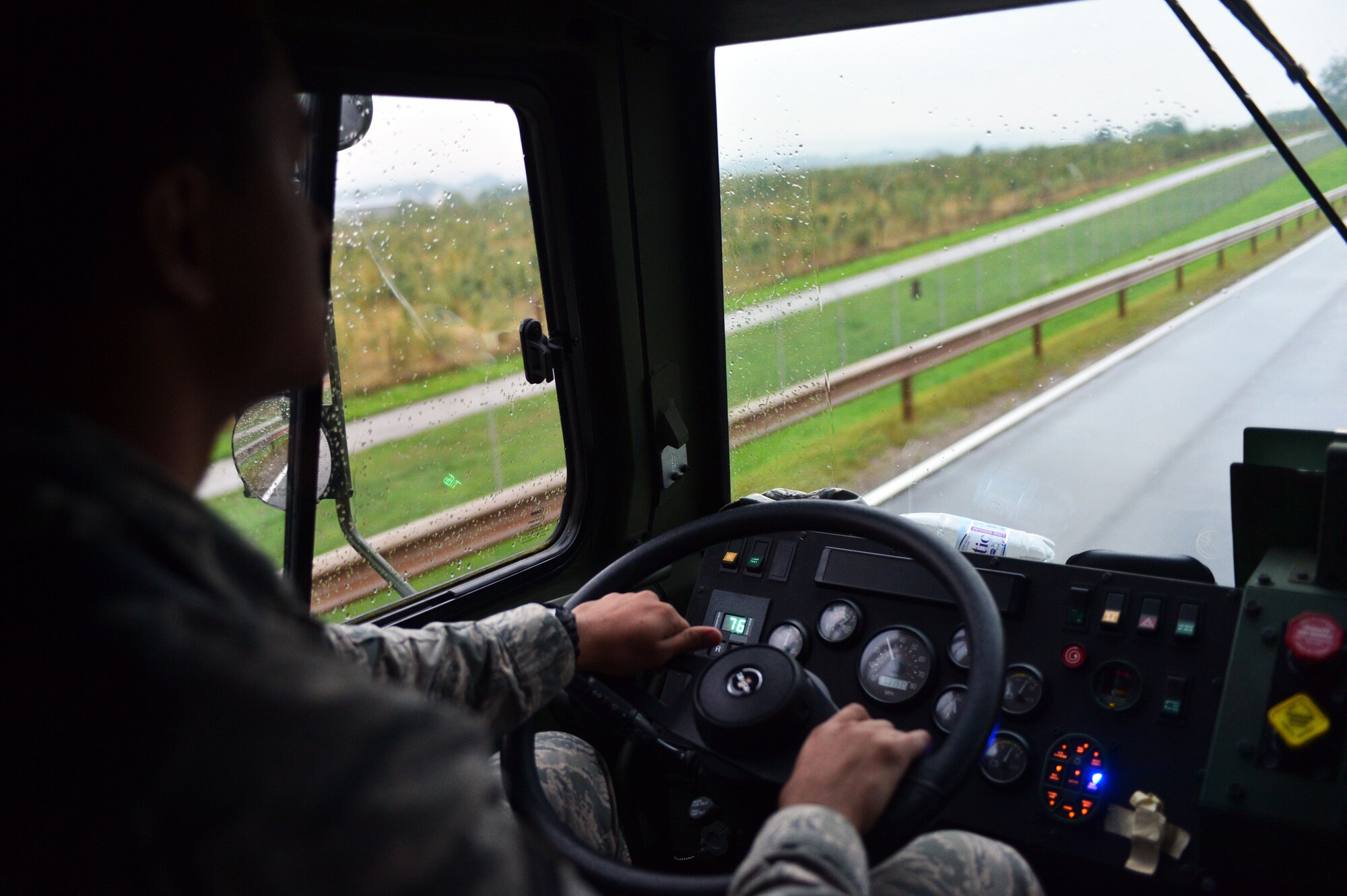 U.S. Air Force Airman 1st Class Anthony Castillo, a 606th Air Control Squadron data maintenance technician, drives down a road during a convoy from Spangdahlem Air Base, Germany, to Poland Sept. 1, 2015. Over 40 vehicles and 120 Airmen from the 606th ACS participated in the convoy in support of Aviation Detachment Rotation 15-4. The U.S. Air Force Aviation Detachment stationed at Łask Air Base, Poland, will host the rotation from Aug. 31 -- Sept. 25, 2015, as the latest training exercise designed to strengthen the interoperability of NATO allies. (U.S. Air Force photo by 2nd Lt. Meredith Mulvihill/Released)