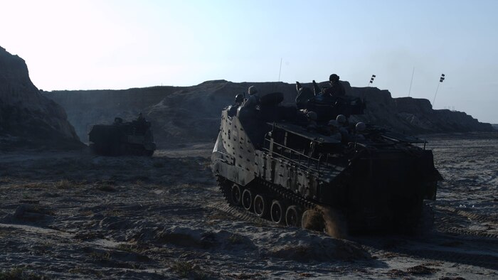 Marines with Alpha Company, 1st Battalion, 5th Marine Regiment provide security on the beach following an amphibious landing as part of Exercise Dawn Blitz 2015 at Marine Corps Base Camp Pendleton, Calif., Sept. 5, 2015. Dawn Blitz is a multinational, amphibious training exercise designed to hone the amphibious landing skills of I Marine Expeditionary Brigade, Expeditionary Strike Group Three and allies of the United States.