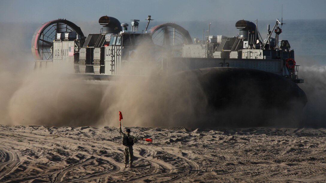 A U.S. Navy Landing Craft Air Cushion maneuvers to exit a beach at Marine Corps Base Camp Pendleton beach and return to a ship during Exercise Dawn Blitz 2015, Sept. 5, 2015. Dawn Blitz is a multinational training exercise designed to enhance Expeditionary Strike Group Three and 1st Marine Expeditionary Brigade’s ability to conduct sea-based operations, amphibious landings, and command and control capabilities alongside Japan, Mexico and New Zealand.