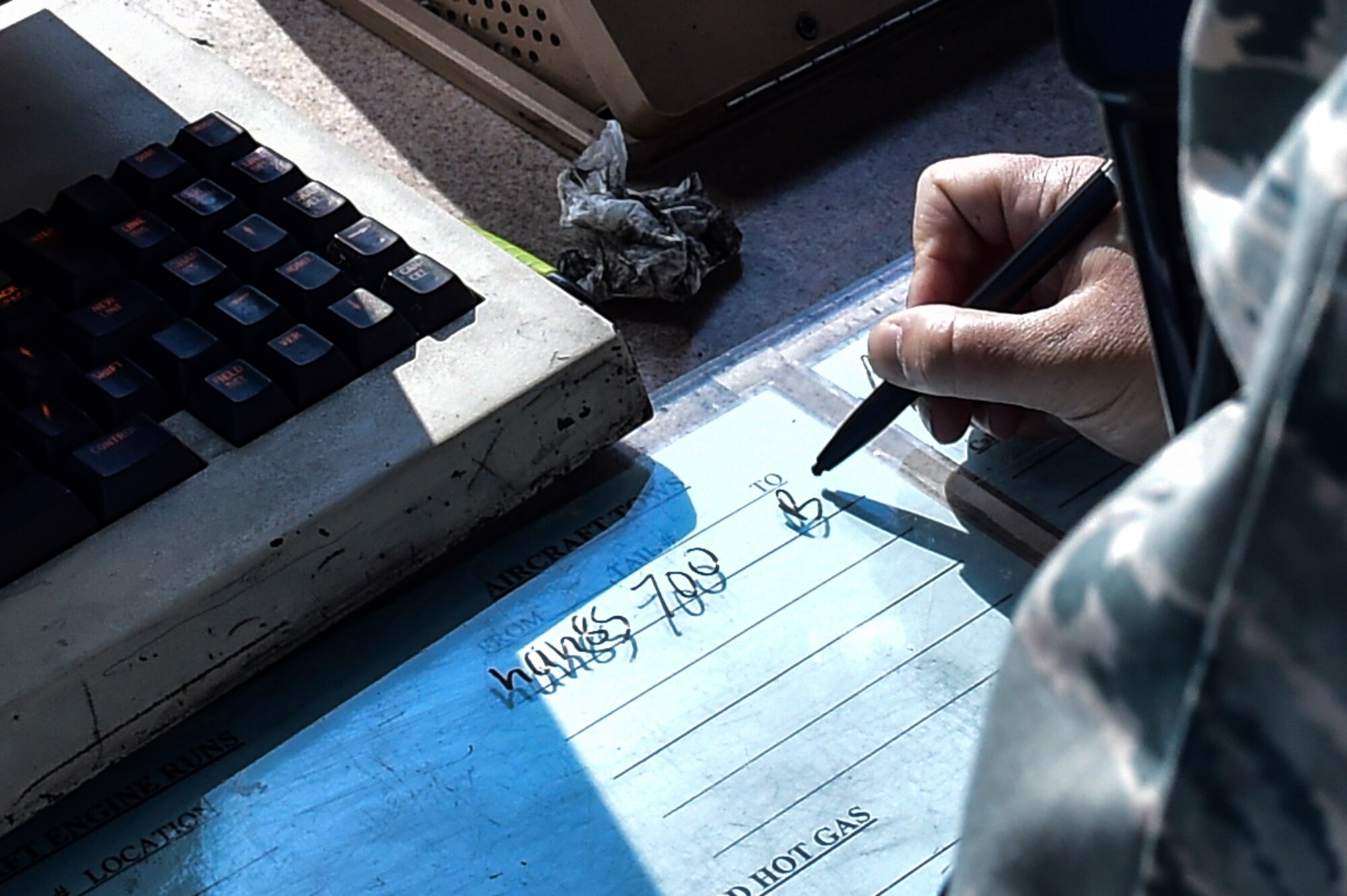 1st Lt. Saskia Deckert, 1st Special Operations Support Squadron airfield operations director of operations, tracks an aircraft being towed at Hurlburt Field, Fla., August 25, 2015. Air traffic controllers track and monitor aircraft movement on the flight line and in the air. (U.S. Air Force photo/Senior Airman Jeff Parkinson)