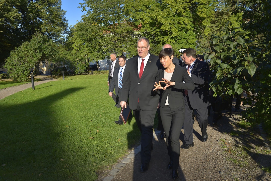 U.S. Deputy Defense Secretary Bob Work walks with Norwegian Defense Minister Ine Eriksen Soreide as they prepare to meet at the Defense Ministry in Oslo, Norway, Sept. 8, 2015. Work is on a weeklong trip that includes stops in Iceland and the United Kingdom. DoD photo by Glenn Fawcett