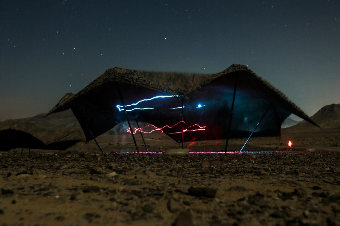 SOUTHWEST ASIA (Aug. 24, 2015)  U.S. Marines with India Company, Battalion Landing Team 3rd Battalion, 1st Marine Regiment, 15th Marine Expeditionary Unit prepare gear for a bi-lateral training exercise. The 15th MEU, embarked aboard the ships of the Essex Amphibious Ready Group, is a forward-deployed, flexible sea-based MAGTF capable of engaging with regional partners and maintaining regional security. (U.S. Marine Corps photo by Sgt. Jamean Berry/Released)
