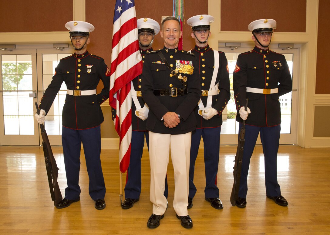 Lt. Gen. William M. Faulkner poses for a photo with the color guard after Faulkner's retirement ceremony on Marine Corps Base Camp Lejeune, N.C., Sept. 4, 2015. (U.S. Marine Corps photo by Sgt. Tia Dufour/Released)