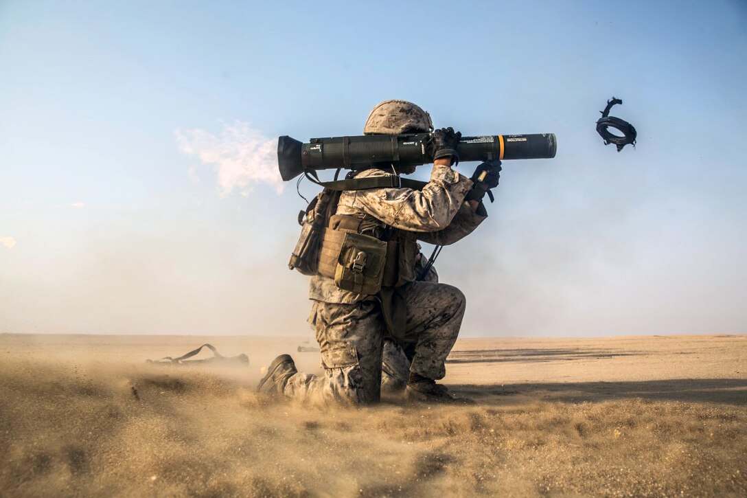 U.S. Marine Corps Lance Cpl. Andres Bravo fires an AT4 rocket at a target during sustainment training in Kuwait, Aug. 26, 2015. Bravo is a rifleman with Kilo Company, Battalion Landing Team 3rd Battalion, 1st Marine Regiment, 15th Marine Expeditionary Unit. U.S. Marine Corps photo by Sgt. Emmanuel Ramos