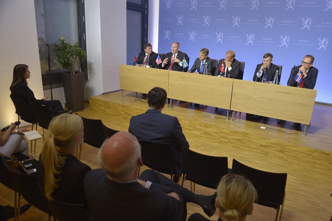 U.S. Deputy Defense Secretary Bob Work, second from left, answers questions from reporters as he and defense and state department leaders from Nordic countries host a press conference in Oslo, Norway, Sept. 8, 2015. DoD photo by Glenn Fawcett