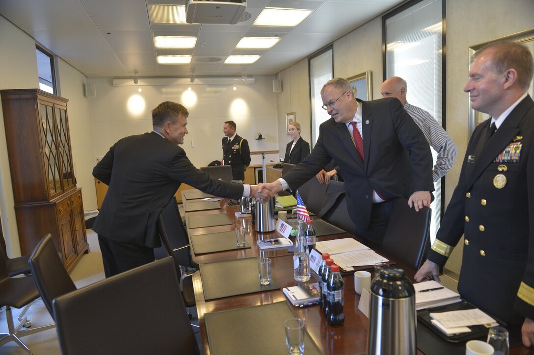 U.S. Deputy Defense Secretary Bob Work, right, shakes hands with Finnish Director General Esa Pulkkinen as they meet in Oslo, Norway, Sept. 8, 2015. DoD photo by Glenn Fawcett