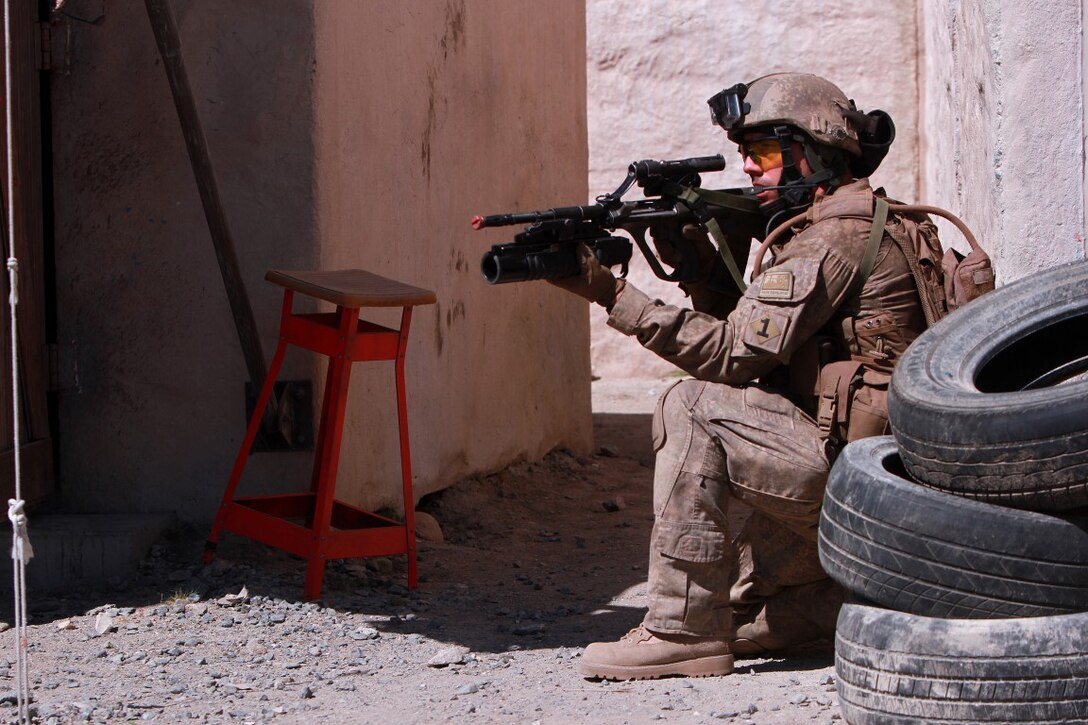 A soldier with 1st Royal New Zealand Infantry Regiment provides security while on patrol in the Infantry Immersion Trainer during Exercise Dawn Blitz at Marine Corps Base Camp Pendleton, Calif., Sept. 7, 2015. The IIT is a training facility that provides individuals with stressful scenarios they might encounter during combat operations in urban areas. Dawn Blitz is a multinational amphibious exercise that promotes interoperability between the U.S. Navy, Marine Corps and coalition partners. (U.S. Marine Corps photo taken by Sgt. Joseph Scanlan)