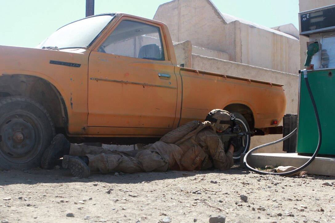 A soldier with 1st Royal New Zealand Infantry Regiment provides security while on patrol in the Infantry Immersion Trainer during Exercise Dawn Blitz at Marine Corps Base Camp Pendleton, Calif., Sept. 7, 2015. The IIT is a training facility that provides individuals with stressful scenarios they might encounter during combat operations in urban areas. Dawn Blitz is a multinational amphibious exercise that promotes interoperability between the U.S. Navy, Marine Corps and coalition partners. (U.S. Marine Corps photo taken by Sgt. Joseph Scanlan)