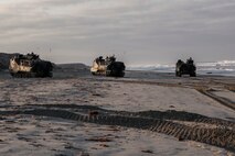 150905-N-MZ309-059 CAMP PENDLETON (Sept. 5, 2015) Three amphibious assault vehicles (AAV) secure the beach during an amphibious landing for Exercise Dawn Blitz 2015. Dawn Blitz 2015 is a scenario-driven exercise designed to train the U.S. Navy and Marine Corps in operations expected of an amphibious task force while also building U.S. and coalition operational interoperability. (U.S. Navy photo by Mass Communication Specialist 2nd Class Ryan Riley/Released)
