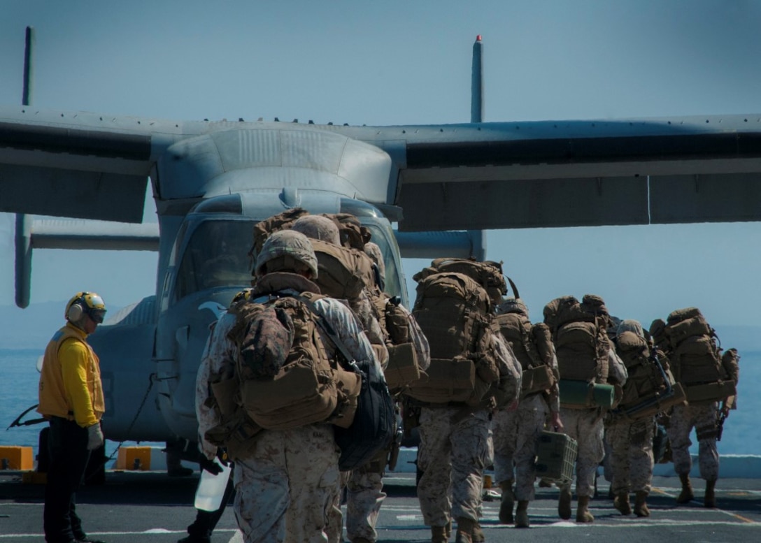 PACIFIC OCEAN (Sept. 5, 2015) – U.S. Marines assigned to 5th Marine Regiment Headquarters prepare to board an MV-22B Tilt-rotor Osprey assigned to Marine Medium Tilt-rotor Squadron (VMM) 163 with 3rd Marine Aircraft Wing during flight operations aboard amphibious transport dock ship USS Somerset (LPD 25) as part of Exercise Dawn Blitz 2015 (DB-15). Dawn Blitz 2015 is a scenario-driven exercise designed to train the U.S. Navy and Marine Corps in operations expected of an amphibious task force while also building U.S. and coalition operational interoperability. The exercise will test staffs in the planning and execution of amphibious operations in a series of live training events at sea and ashore. (U.S. Navy photo by Mass Communication Specialist 1st Class Vladimir Ramos/Released