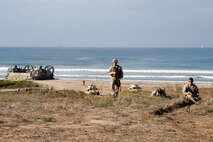 150905-N-MZ309-234 CAMP PENDLETON (Sept. 5, 2015) Marines secure the beach during an amphibious landing for Exercise Dawn Blitz 2015. Dawn Blitz 2015 is a scenario-driven exercise designed to train the U.S. Navy and Marine Corps in operations expected of an amphibious task force while also building U.S. and coalition operational interoperability. (U.S. Navy photo by Mass Communication Specialist 2nd Class Ryan Riley/Released)