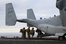 U.S. Marines with 5th Marine Regiment, 1st Marine Division board an MV-22B Osprey during Exercise Dawn Blitz, Sept. 5, 2015. Dawn Blitz 2015, a joint multinational amphibious exercise, promotes interoperability between the Navy, Marine Corps and Coalition partners. (U.S. Marine Corps photo by Lance Cpl. Eryn L. Edelman, 3D MAW Combat Camera/Released)