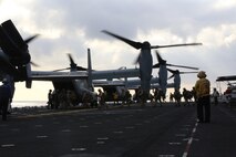 U.S. Marines with 5th Marine Regiment, 1st Marine Division board MV-22B Ospreys during Exercise Dawn Blitz, Sept. 5, 2015. Dawn Blitz 2015, a joint multinational amphibious exercise, promotes interoperability between the Navy, Marine Corps and Coalition partners. (U.S. Marine Corps photo by Lance Cpl. Eryn L. Edelman, 3D MAW Combat Camera/Released)