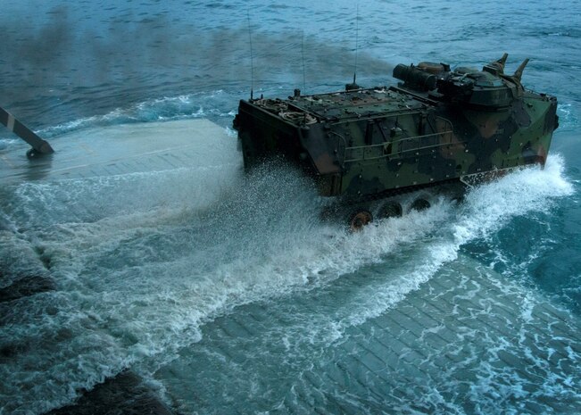 CAMP PENDLETON, Calif. (Sept. 3, 2015) An amphibious assault vehicle (AAV) with 3rd Assault Amphibian Battalion splashes into the Pacific Ocean during a ship to shore exercise movement aboard amphibious transport dock ship USS Somerset (LPD 25). Somerset is currently participating in Exercise Dawn Blitz 2015 (DB-15). Exercise DB-15 is a multinational training conducted by Expeditionary Strike Group 3 (ESG-3) and 1st Marine Expeditionary Brigade (1 MEB) to build U.S., Japan, Mexico, and New Zealand’s amphibious and command and control capabilities through live, simulated, and constructive military training activities off the coast and ashore at Marine Corps Base Camp Pendleton and at Marine Corps Air Ground Combat Training Center 29 Palms, California. Somerset is the ninth San Antonio-class amphibious transport dock ship. (U.S. Navy photo by Mass Communication Specialist 1st Class Vladimir Ramos/Released)