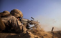 KUWAIT (Aug. 17, 2015) A U.S. Marine with Lima Company, Battalion Landing Team 3rd Battalion, 1st Marine Regiment, 15th Marine Expeditionary Unit, fires at targets with his M240B machine gun during squad-level training. Elements of the 15th MEU are ashore in Kuwait for sustainment training to maintain and enhance the skills they developed during their pre-deployment training period.  The 15th MEU is embarked with the Essex Amphibious Ready Group and deployed to maintain regional security in the U.S. 5th Fleet area of operations. (U.S. Marine Corps photo by Cpl. Elize McKelvey/Released)