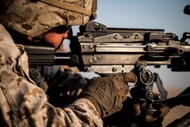 KUWAIT (Aug. 17, 2015) A U.S. Marine with Lima Company, Battalion Landing Team 3rd Battalion, 1st Marine Regiment, 15th Marine Expeditionary Unit, fires at targets with his M240B machine gun during squad-level training. Elements of the 15th MEU are ashore in Kuwait for sustainment training to maintain and enhance the skills they developed during their pre-deployment training period.  The 15th MEU is embarked with the Essex Amphibious Ready Group and deployed to maintain regional security in the U.S. 5th Fleet area of operations. (U.S. Marine Corps photo by Cpl. Elize McKelvey/Released)