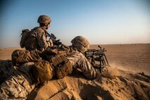 KUWAIT (Aug. 17, 2015) U.S. Marines with Lima Company, Battalion Landing Team 3rd Battalion, 1st Marine Regiment, 15th Marine Expeditionary Unit, fire their weapons at targets during squad-level training. Elements of the 15th MEU are ashore in Kuwait for sustainment training to maintain and enhance the skills they developed during their pre-deployment training period.  The 15th MEU is embarked with the Essex Amphibious Ready Group and deployed to maintain regional security in the U.S. 5th Fleet area of operations. (U.S. Marine Corps photo by Cpl. Elize McKelvey/Released)