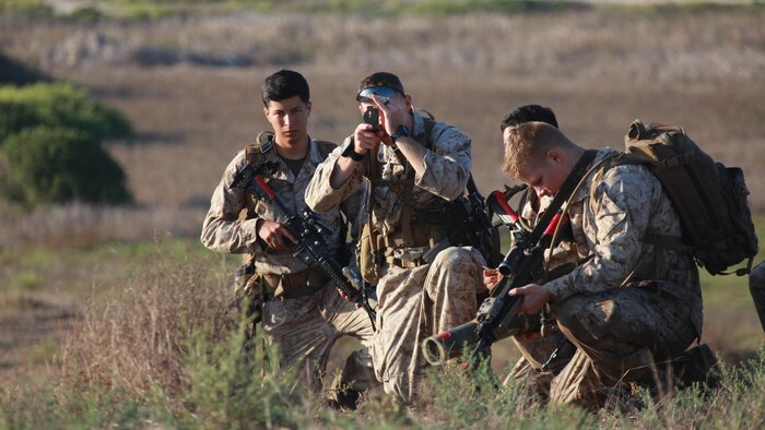 Marines with 1st Battalion, 5th Marine Regiment, 1st Marine Division use a compass to determine their left and right lateral limits on the beaches of Marine Corps Base Camp Pendleton, Calif., during Exercise Dawn Blitz 2015, Sept. 5, 2015. Dawn Blitz is a multinational training exercise designed to enhance Expeditionary Strike Group Three and 1st Marine Expeditionary Brigade’s ability to conduct sea-based operations, amphibious landings, and command and control capabilities alongside Japan, Mexico and New Zealand.