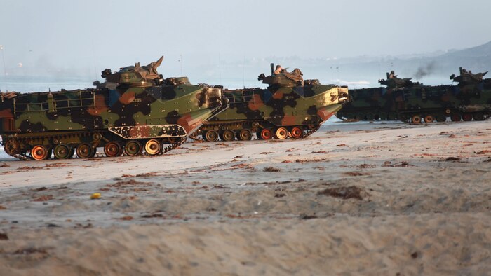 U.S. Marine Corps amphibious assault vehicles assigned to 3rd Assault Amphibious Battalion come ashore on the beaches of Marine Corps Base Camp Pendleton, Calif., during an amphibious landing in support of Exercise Dawn Blitz 2015, Sept. 5, 2015. Dawn Blitz is a multinational training exercise designed to enhance Expeditionary Strike Group Three and 1st Marine Expeditionary Brigade’s ability to conduct sea-based operations, amphibious landings, and command and control capabilities alongside Japan, Mexico and New Zealand.