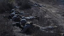 Marines with Alpha Company, 1st Battalion, 5th Marine Regiment provide security on the beach following an amphibious landing as part of Exercise Dawn Blitz 2015 at Marine Corps Base Camp Pendleton, Calif., Sept. 5, 2015. Dawn Blitz is a multinational, amphibious training exercise designed to hone the amphibious landing skills of I Marine Expeditionary Brigade, Expeditionary Strike Group Three and allies of the United States.