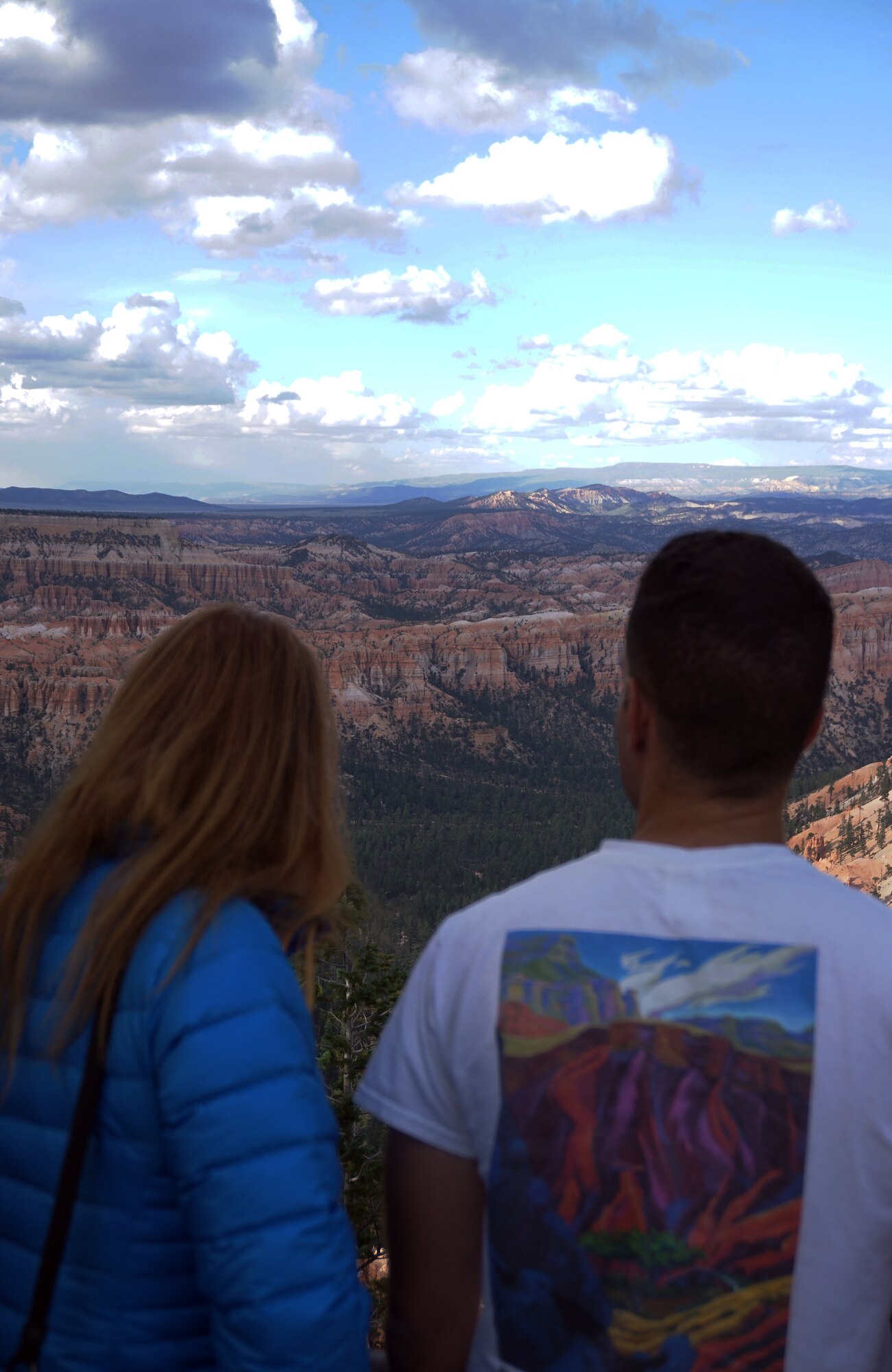 Airman 1st Class Cesar Bustamante, 90th Logistics Readiness Squadron on F.E. Warren Air Force Base, Wyo., and his wife, Kim, look out over Bryce Canyon National Park, Utah, Sept. 4, 2015. After 12 hours in a van, a group of 11 Airmen watched the sun set over the national park. (U.S. Air Force photo by Airman 1st Class Brandon Valle)
