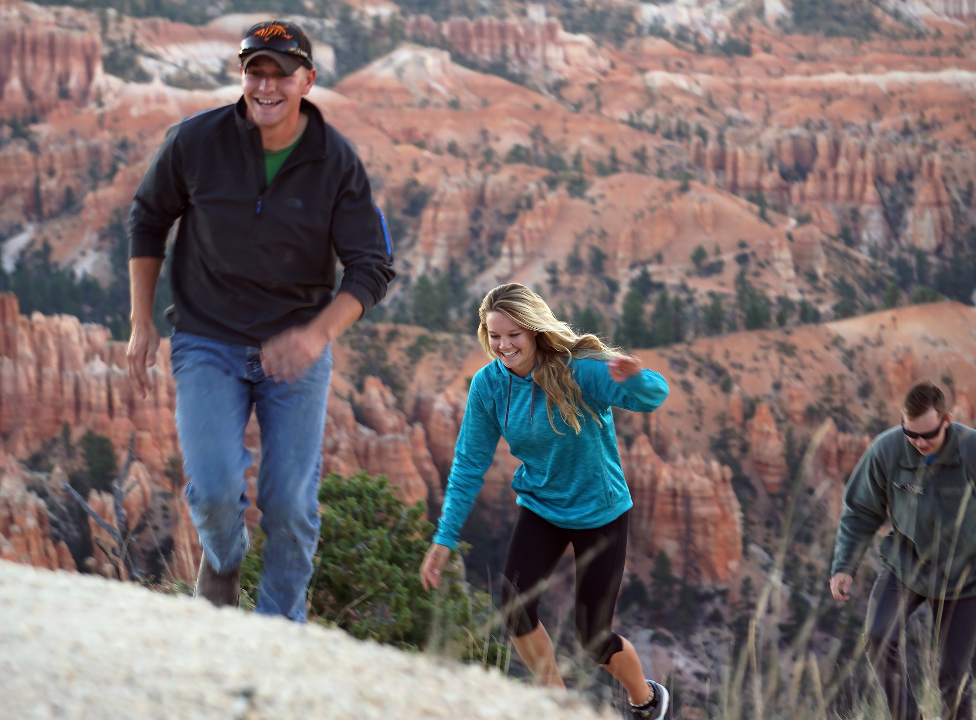 Airman 1st Class Jeffrey Johnson, 90th Civil Engineer Squadron heavy equipment technician; Rachel Bower, F.E. Warren Aquatics Center lifeguard; and Austin Welch, 90th Logistics Readiness Squadron – all F.E. Warren Air Force Base, Wyo. – run up the Bryce Point Trail in Bryce Canyon National Park, Utah, Sept. 4, 2015. The group participated in a four-day trip through the Outdoor Recreation’s single Airmen program. (U.S. Air Force photo by Airman 1st Class Brandon Valle)