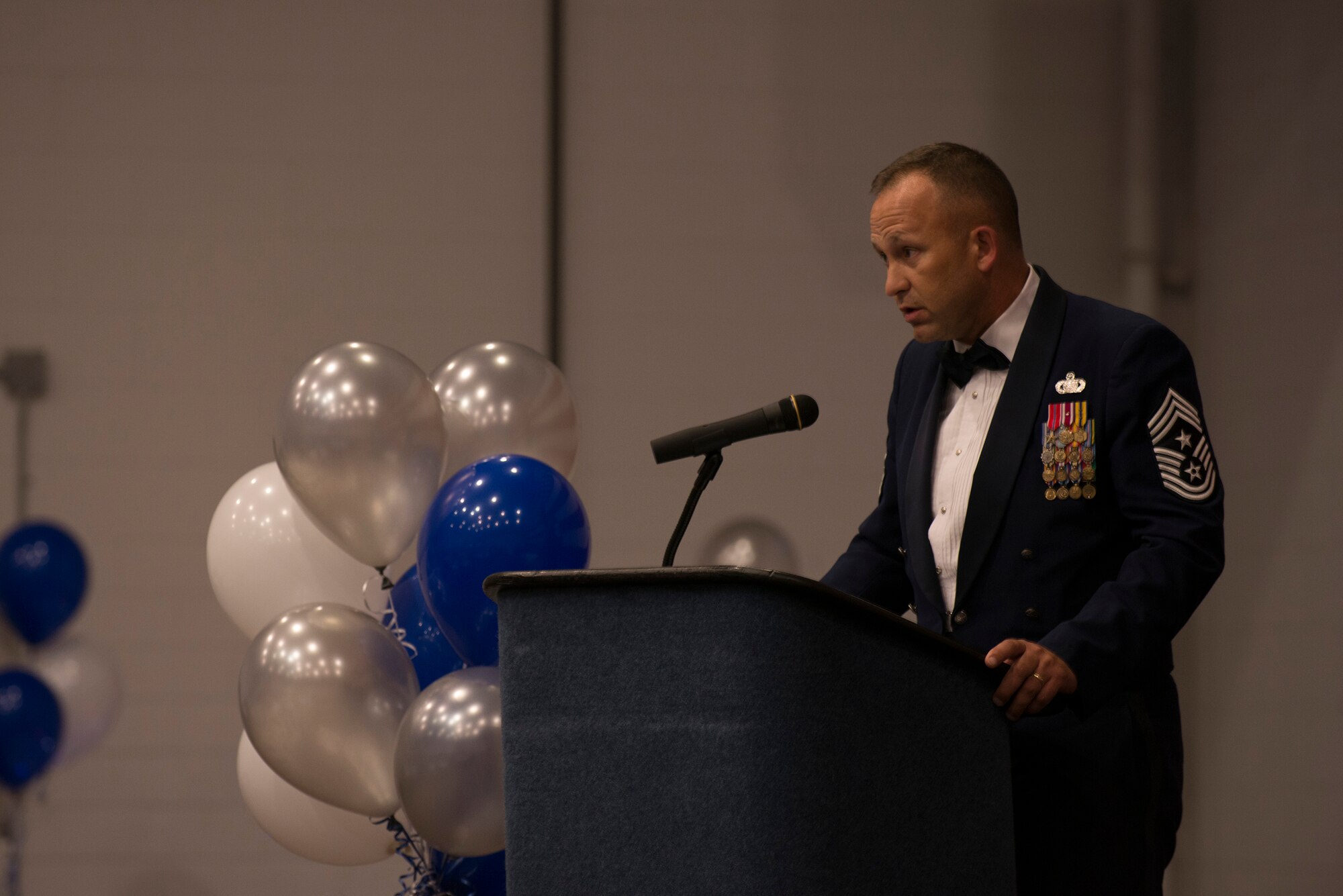 U.S. Air Force Chief Master Sgt. David Kelch, 23d Wing command chief, speaks to inductees during a senior NCO induction ceremony Aug. 28, 2015, at Moody Air Force Base, Ga. Kelch congratulated the inductees on their selection for promotion and reminded them of the responsibilities of a SNCO. (U.S. Air Force photo by Airman 1st Class Dillian Bamman/Released)