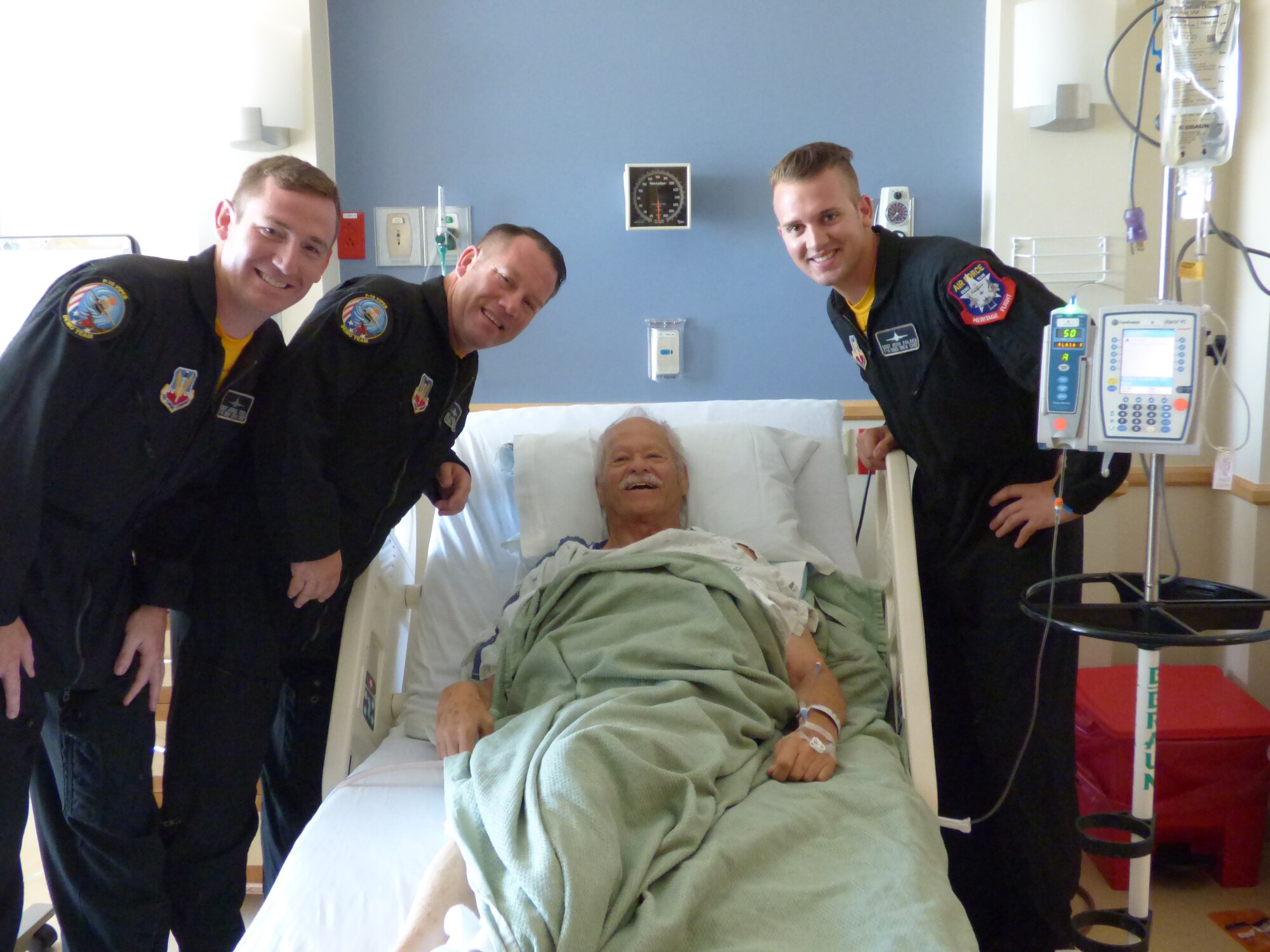 Members of the Viper Demo Team visit with a patient at the Good Samaritan Medical Center in Lafayette, Co., Aug. 13, 2015. (Courtesy photo)